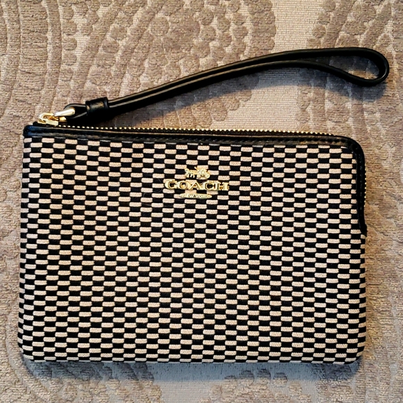 Coach Handbags - Coach Black and Tan Wallet Wristlet